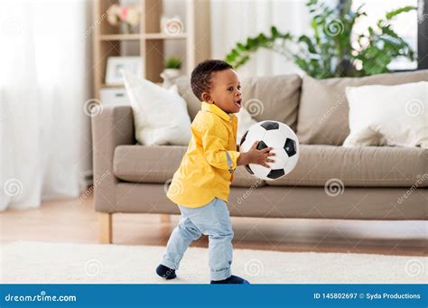 African American Baby Boy Playing with Soccer Ball Stock Image - Image ...