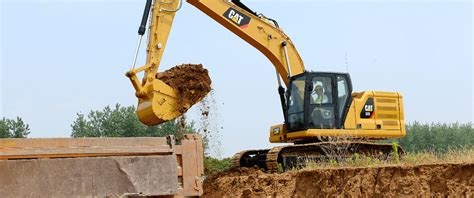 Wheel vs. Track Excavators | The Cat Rental Store