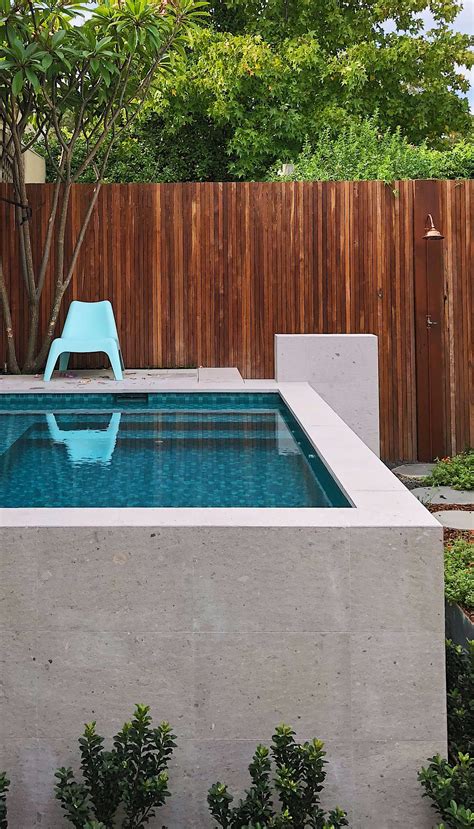 Raised pool in a small garden. Designed in partnership with Helen ...