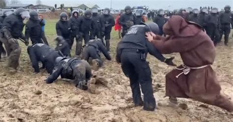 These German riot police being defeated by a 'mud wizard' is a ...