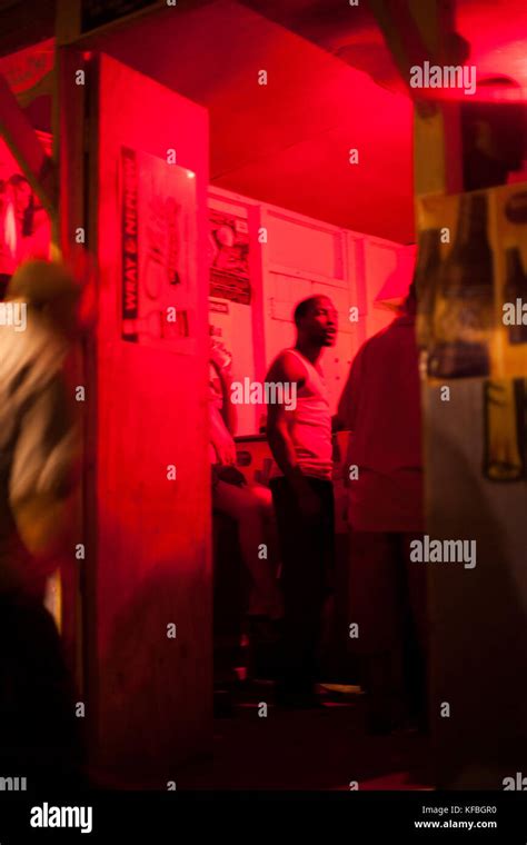 JAMAICA, Port Antonio. Locals drinking at a local bar Stock Photo - Alamy