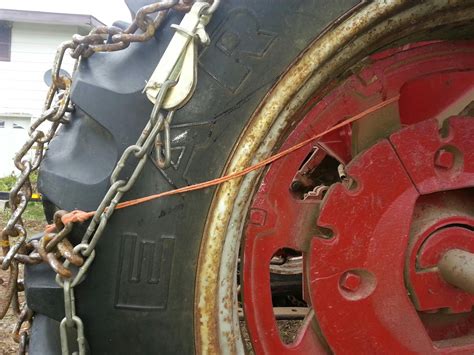 Otter Creek Redneck: How to Put On Tractor Tire Chains