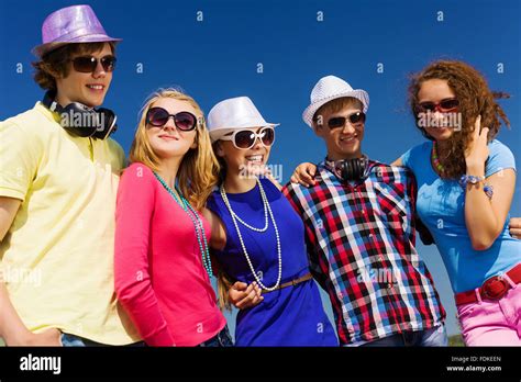 Group of young and happy people having party Stock Photo - Alamy