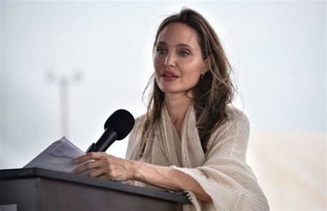 FULL STORY > Angelina Jolie on Religion: 'We're Not Alone in the World'