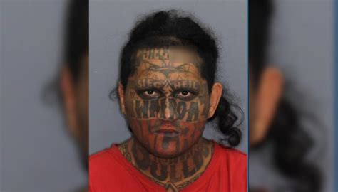 Police searching for 'extremely dangerous' man with distinctive facial tattoos in connection ...