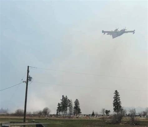 Out of control wildfire prompts Pine Creek First Nation to declare state of emergency | CBC News