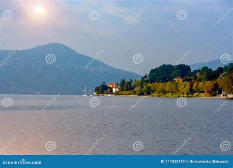 Evening View of the City from the Lake. View of the City Waterfront and Mountains Stock Image ...