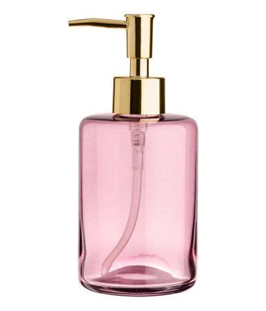 Pink. Soap dispenser in glass with a gold-colored plastic pump. Diameter 3 in., height 4 1/4 in ...