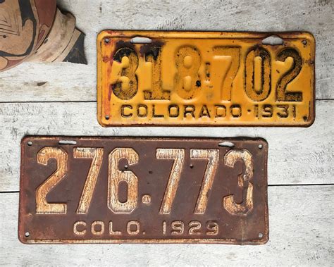 Unrestored 1931 Rustic Yellow Metal License Plate from Colorado, Salvage Industrial Decor