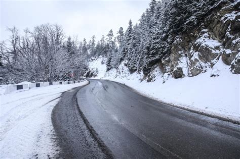 Premium Photo | Snowy road in winter landscape