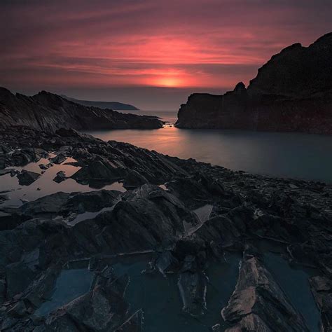 Deep sunset over Blue Lagoon, Abereiddy | Blue lagoon, Pembrokeshire, Lagoon