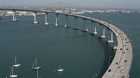 4K stock footage aerial video of tracking light traffic on the Coronado ...