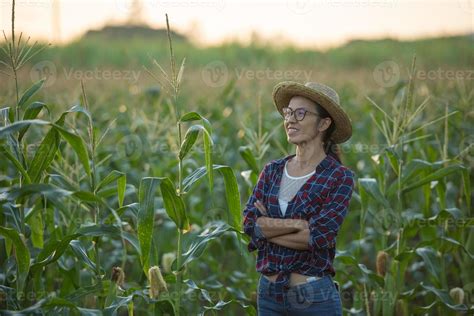 Portrait of pretty young farmer woman with crossed arms, Beautiful ...