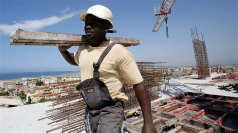 Algeria is giving legal status to black African workers but a nasty anti-migrant campaign is growing