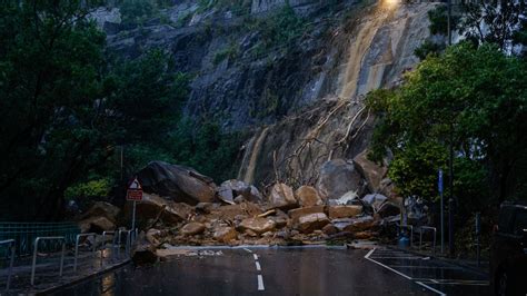 Two dead after Hong Kong flooded by heaviest rainfall in almost 140 ...