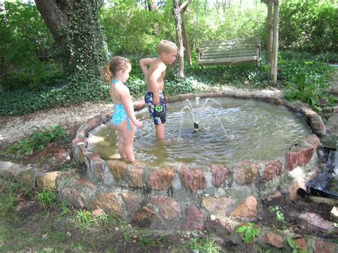 fountain wading pool | Backyard water feature, Pool fountain, Wading pool ideas