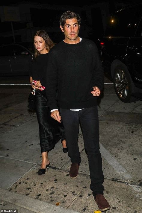 Ashley Benson and Brandon Davis, oil heir fiancé, coordinate chic black ensembles for a romantic ...