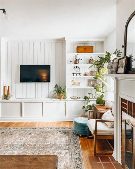 Vertical White Shiplap TV Wall with White Floating Shelves - Soul & Lane