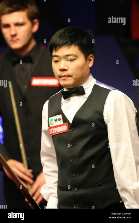 25.04.2012, Sheffield, England. Ding Junhui contemplates a snooker ...