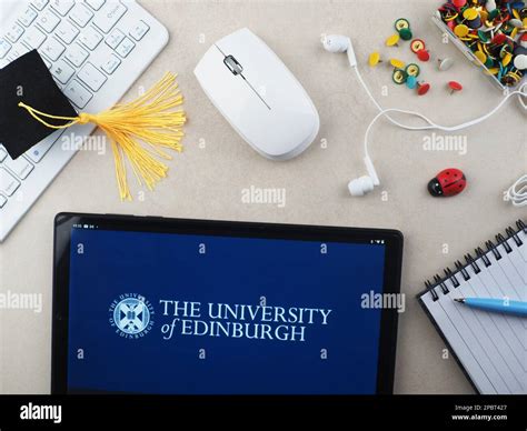 In this photo illustration, The University of Edinburgh logo seen ...