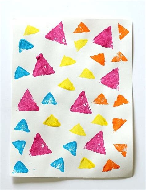 Learning Shapes: Sponge Stamped Triangle Collage | Learning shapes, Learning shapes activities ...