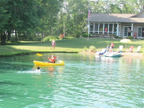 pond before & after 2006-2011: Pond now,2011..... 1/2 acre, 15ft deep at deepest ,sand beach ...