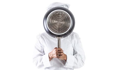 A Chef in with a Frying Pan Covers His Face - Isolated on White Stock ...