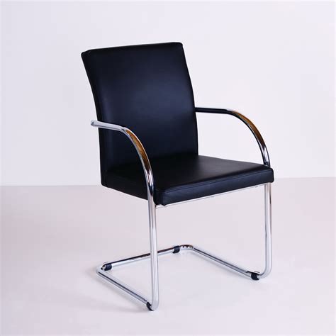 Conference chair with comfortable upholstery and stackable frame