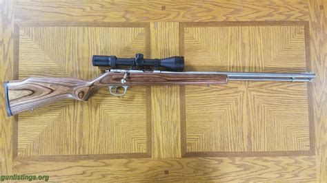 Gunlistings.org - Rifles Marlin XT .22 Mag Stainless Laminate W/scope