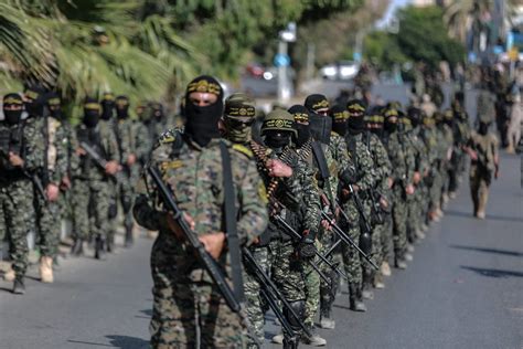 GAZA CITY, GAZA – JUNE 08: Members of Al-Quds Brigades, the armed wing of Islamic Jihad Movement ...