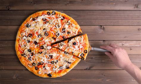 14 Weird Pizza Toppings Around the World [Video]