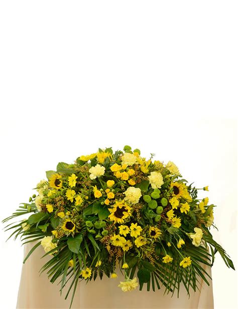 Serene Sunflowers Casket Spray | Incredible Florist