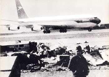 BOAC Flight 911 taxiing for departure past the wreckage of a Canada Pacific DC-8 at Tokyo’s ...