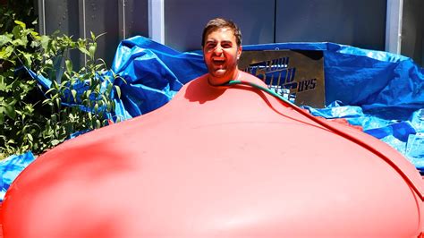 6ft Man in 6ft Giant Water Balloon - 4K - The Slow Mo Guys - YouTube