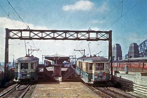 transpress nz: Sydney trams at the north end of the Harbour Bridge, 1950s