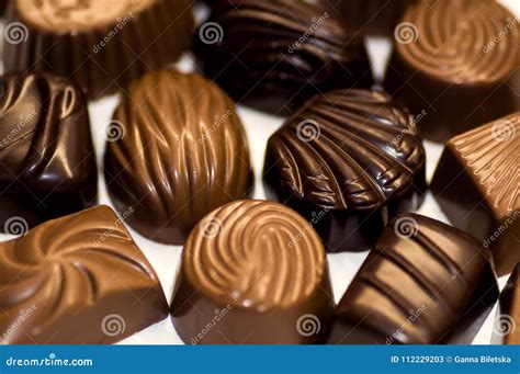 Chocolate Candy of Various Shapes with Different Fillings. Stock Image - Image of sugar, milk ...