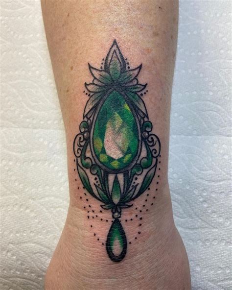 The Top 23 Emerald Tattoo Ideas - [2021 Inspiration Guide] | Tattoos, Stone tattoo, Green tattoos