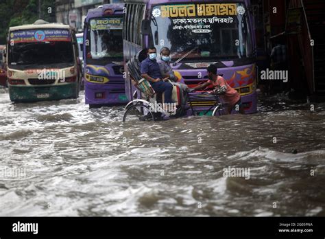 Jun 01, 2021.Dhaka,Bangladesh. Vehicles pass through a flooded street ...