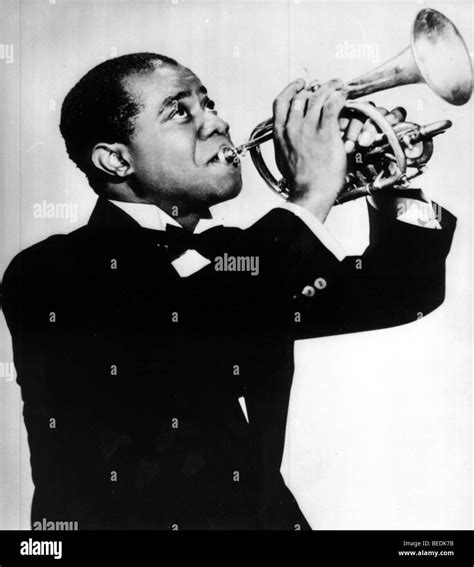 Portrait louis armstrong playing trumpet hi-res stock photography and ...