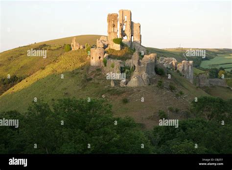 The great rugged ruins of an ancient Norman fortress dominate a strategic pass in the Purbeck ...