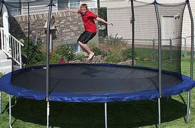 Skywalker Trampolines 15-Feet Round Trampoline and Enclosure with Spring Pad