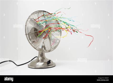 Electric fan with streamers Stock Photo - Alamy