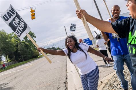 Tens of thousands of General Motors auto workers go on strike