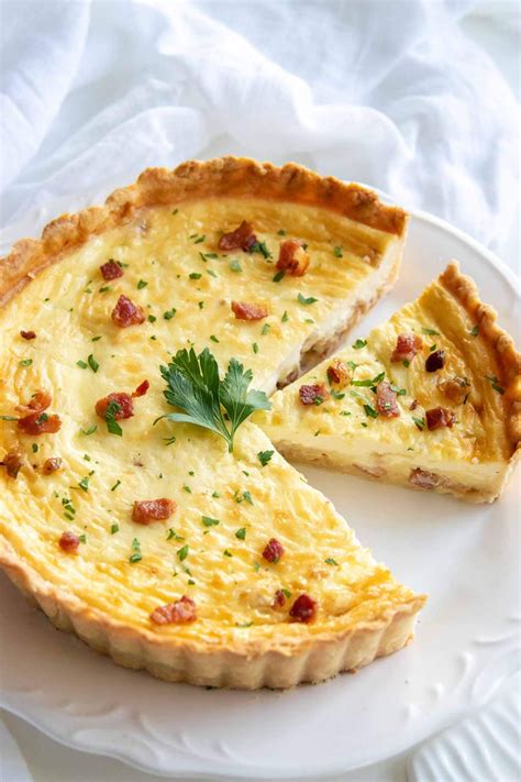 Classic Quiche Lorraine with a savory egg custard, bacon, and cheese ...