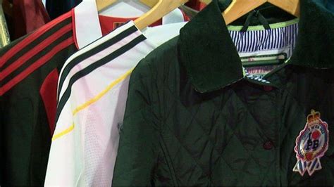 Police Scotland donates fake designer clothes to charity - BBC News