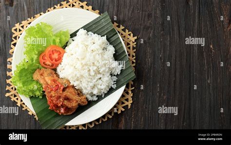 Top View Ayam Penyet. Deep Fried Chicken Served with Sambel or Sambal, Spicy Chilli Sauce. Ayam ...