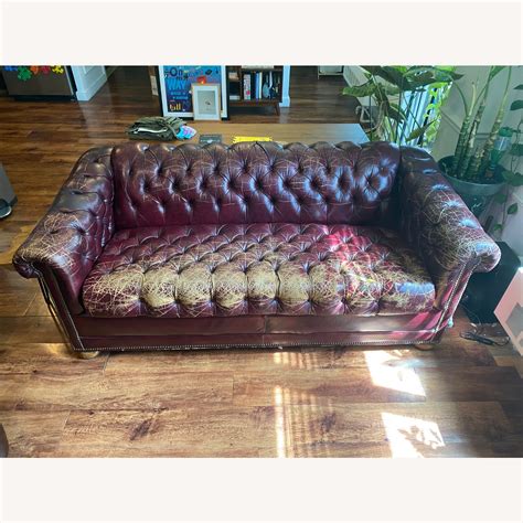 Vintage Leather Button Pull Out Couch - AptDeco