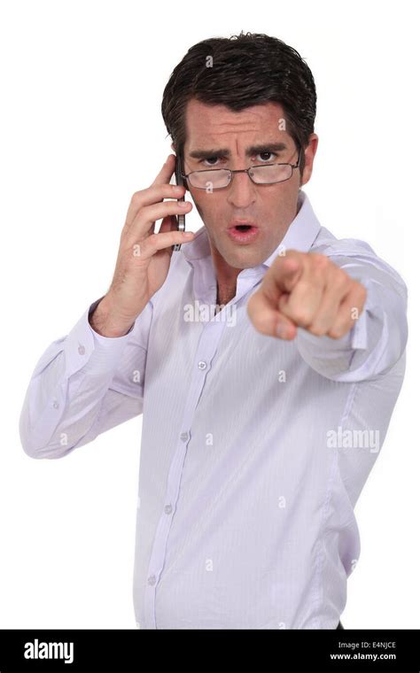 Angry man pointing his finger Stock Photo - Alamy