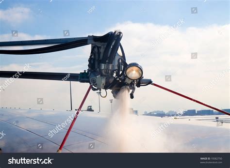 De-Ice Airplane During Winter Before Takeoff. Stock Photo 10582750 : Shutterstock