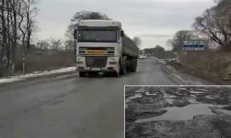 Is this the worst road in Europe? Try this terrifying video from the potholed 'motorways' of ...